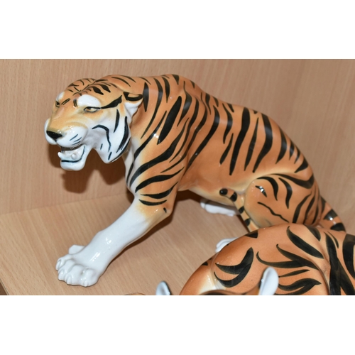 375 - A GROUP OF LOMONOSOV TIGERS, comprising a large recumbent tiger, height 17cm x length 30cm (remnants... 