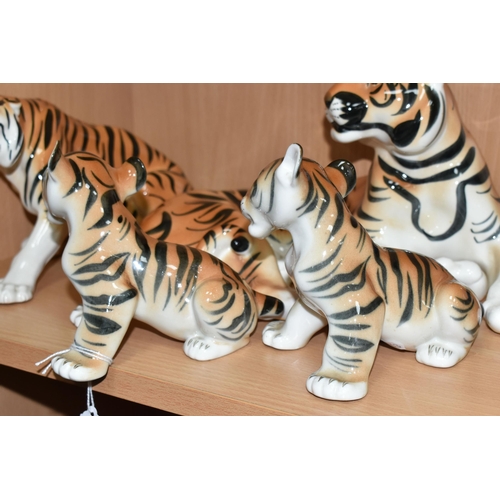 375 - A GROUP OF LOMONOSOV TIGERS, comprising a large recumbent tiger, height 17cm x length 30cm (remnants... 