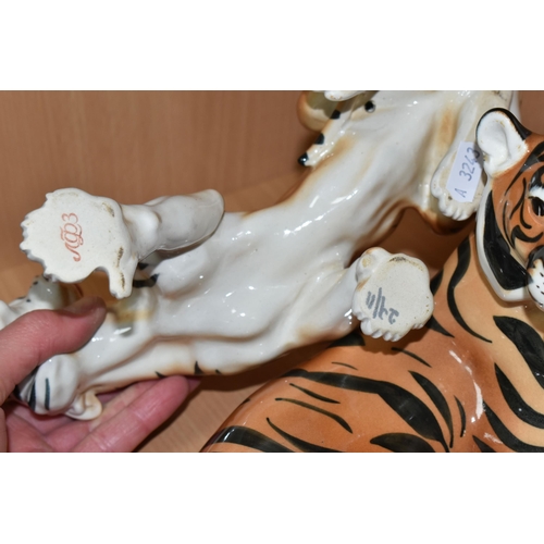 375 - A GROUP OF LOMONOSOV TIGERS, comprising a large recumbent tiger, height 17cm x length 30cm (remnants... 