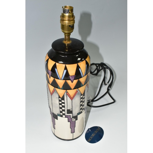 378 - A MOORCROFT POTTERY 'DERNGATE' PATTERN TABLE LAMP, of cylindrical form, the geometric Charles Rennie... 