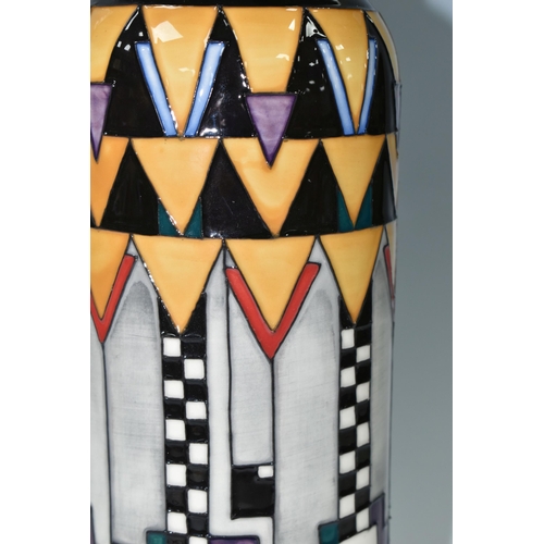 378 - A MOORCROFT POTTERY 'DERNGATE' PATTERN TABLE LAMP, of cylindrical form, the geometric Charles Rennie... 