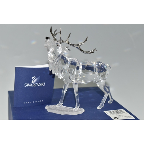 387 - A BOXED SWAROVSKI CRYSTAL 'STAG' SCULPTURE, depicting a stag with metal antlers, model no 291431, fr... 