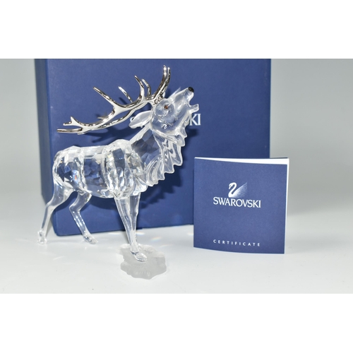 387 - A BOXED SWAROVSKI CRYSTAL 'STAG' SCULPTURE, depicting a stag with metal antlers, model no 291431, fr... 