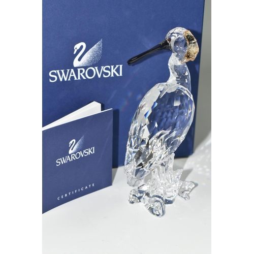 388 - A BOXED SWAROVSKI CRYSTAL 'SPOONBILL' SCULPTURE, depicting a Spoonbill with coloured beak standing a... 