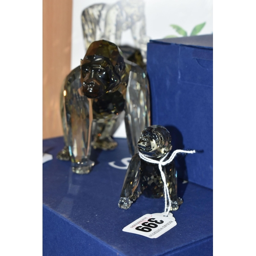 399 - THREE BOXED SWAROVSKI CRYSTAL 2009 ANNUAL EDITION GORILLA SCULPTURES, from the Endangered Wildlife t... 