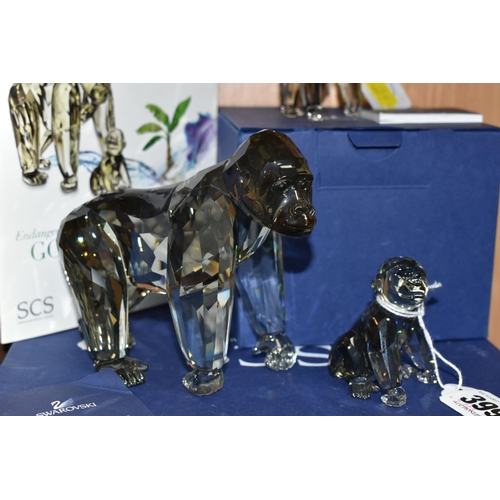 399 - THREE BOXED SWAROVSKI CRYSTAL 2009 ANNUAL EDITION GORILLA SCULPTURES, from the Endangered Wildlife t... 