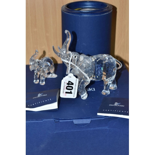 401 - TWO BOXED SWAROVSKI CRYSTAL ELEPHANTS, comprising Elephant Mother no 678945, designer Heinz Tabertsh... 