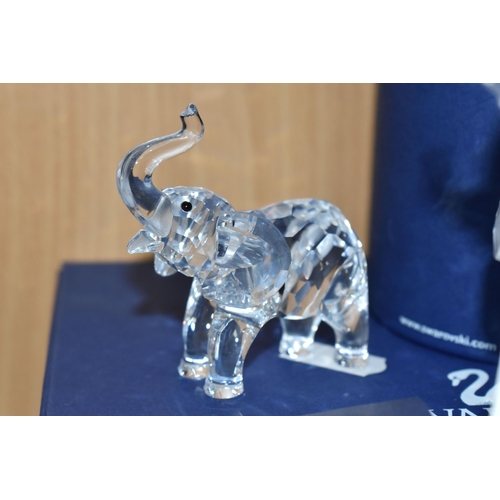 401 - TWO BOXED SWAROVSKI CRYSTAL ELEPHANTS, comprising Elephant Mother no 678945, designer Heinz Tabertsh... 