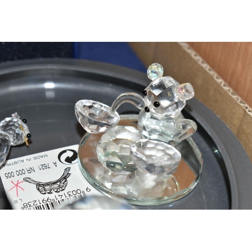 404 - TWO BOXES OF SWAROVSKI CRYSTAL ITEMS, to include a boxed Swan joining/renewal gift, Blue Starfish an... 