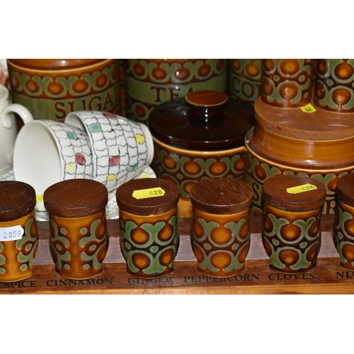 428 - A COLLECTION OF HORNSEA 'BRONTE' DESIGN KITCHEN CANNISTERS AND CLARICE CLIFF DESIGN PLATES, comprisi... 