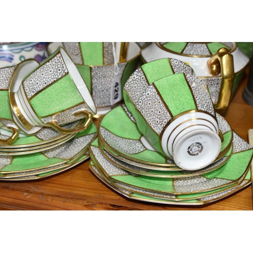 429 - A GROUP OF ROYAL STAFFORD TEAWARE AND POOLE POTTERY, a green, white and gilt art deco design Royal S... 