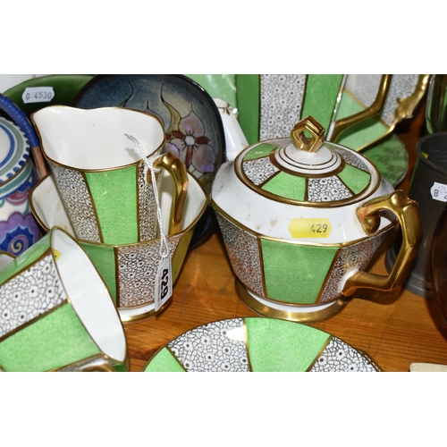 429 - A GROUP OF ROYAL STAFFORD TEAWARE AND POOLE POTTERY, a green, white and gilt art deco design Royal S... 