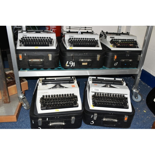 434 - FIVE ROBOTRON 'ERIKA' TYPEWRITERS, mechanical model No.105 made in GDR, with carry cases (5 + 5 case... 