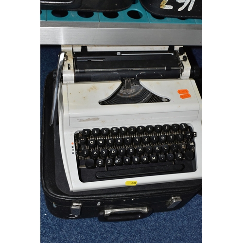 434 - FIVE ROBOTRON 'ERIKA' TYPEWRITERS, mechanical model No.105 made in GDR, with carry cases (5 + 5 case... 