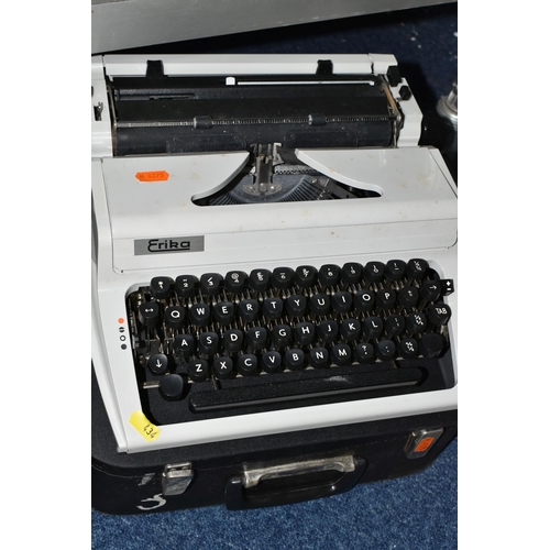 434 - FIVE ROBOTRON 'ERIKA' TYPEWRITERS, mechanical model No.105 made in GDR, with carry cases (5 + 5 case... 