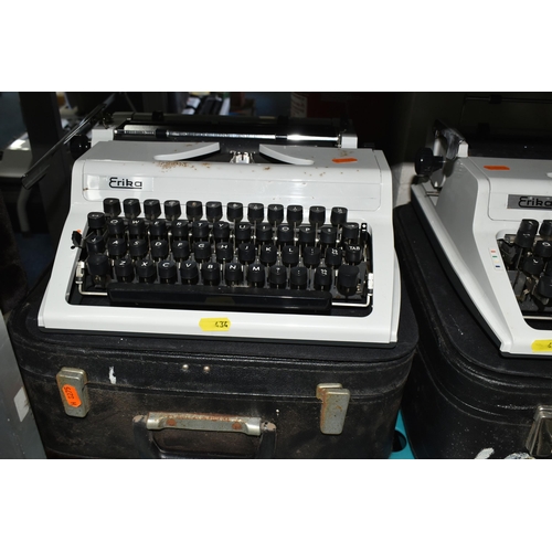 434 - FIVE ROBOTRON 'ERIKA' TYPEWRITERS, mechanical model No.105 made in GDR, with carry cases (5 + 5 case... 