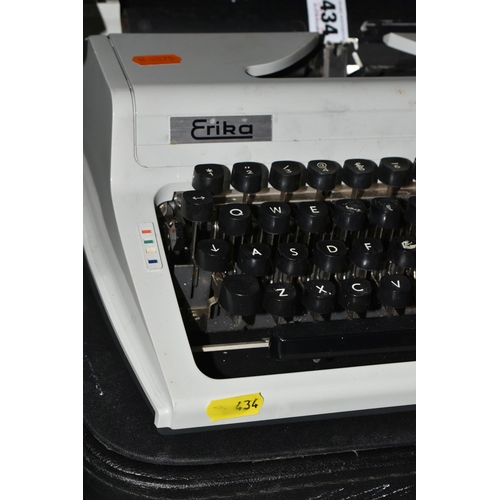 434 - FIVE ROBOTRON 'ERIKA' TYPEWRITERS, mechanical model No.105 made in GDR, with carry cases (5 + 5 case... 