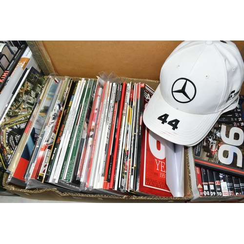 437 - FOUR BOXES & LOOSE OF FORMULA 1 EPHEMERA to include hardback books featuring James Hunt, Lewis Hamil... 