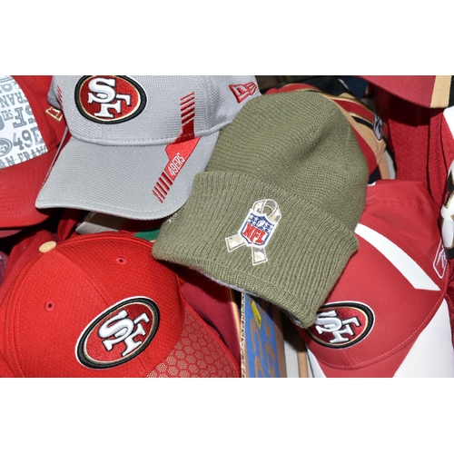 439 - A COLLECTION OF SAN FRANCISCO 49ERS MEMORABILIA, to include replica shirts, large quantity of assort... 