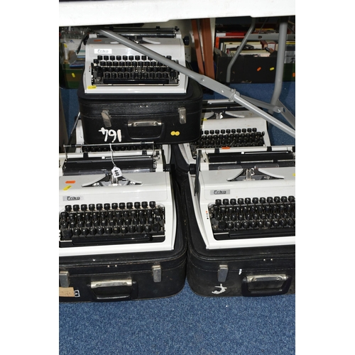 440 - FIVE ROBOTRON 'ERIKA' TYPEWRITERS, mechanical model No.105 made in GDR, with carry cases (5 + 5 case... 