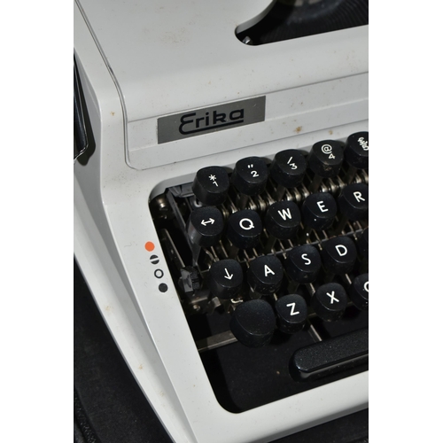 440 - FIVE ROBOTRON 'ERIKA' TYPEWRITERS, mechanical model No.105 made in GDR, with carry cases (5 + 5 case... 