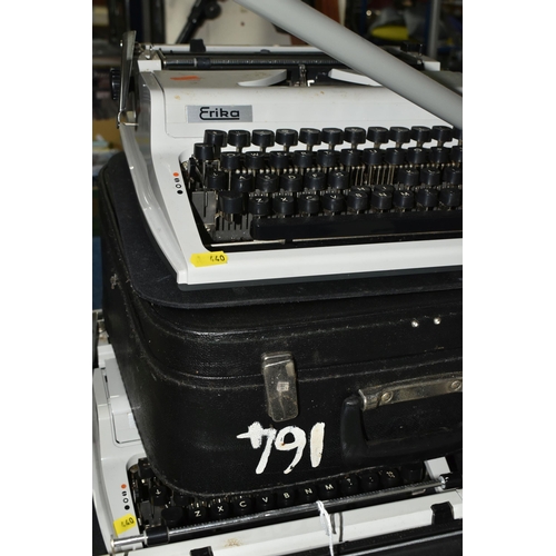 440 - FIVE ROBOTRON 'ERIKA' TYPEWRITERS, mechanical model No.105 made in GDR, with carry cases (5 + 5 case... 