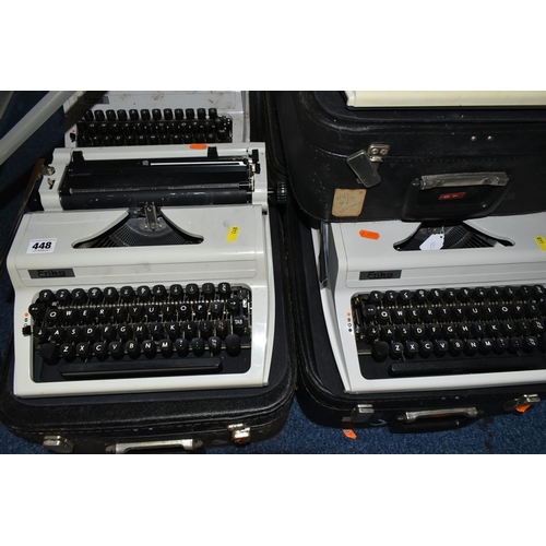 448 - FIVE ROBOTRON 'ERIKA' TYPEWRITERS, mechanical model No.105 made in GDR, with carry cases (5 + 5 case... 