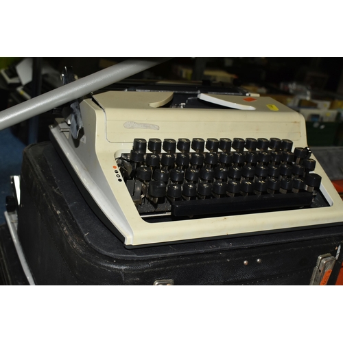 448 - FIVE ROBOTRON 'ERIKA' TYPEWRITERS, mechanical model No.105 made in GDR, with carry cases (5 + 5 case... 