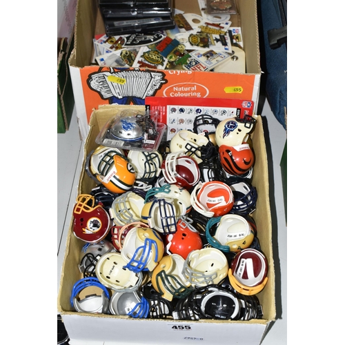 455 - A COLLECTION OF ASSORTED UNBOXED RIDDEL PLASTIC POCKET SIZE NFL HELMETS, assorted teams from the lat... 