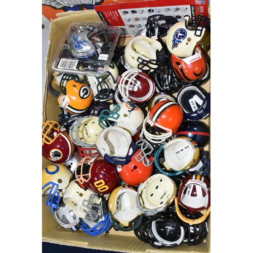 455 - A COLLECTION OF ASSORTED UNBOXED RIDDEL PLASTIC POCKET SIZE NFL HELMETS, assorted teams from the lat... 