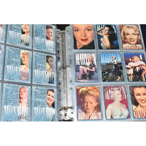 458 - A COLLECTION OF MODERN MARILYN MONROE MEMORABILIA, to include sets of trading cards, photographs and... 