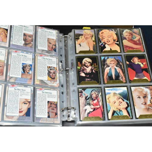 458 - A COLLECTION OF MODERN MARILYN MONROE MEMORABILIA, to include sets of trading cards, photographs and... 