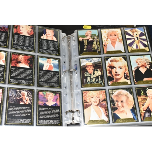 458 - A COLLECTION OF MODERN MARILYN MONROE MEMORABILIA, to include sets of trading cards, photographs and... 