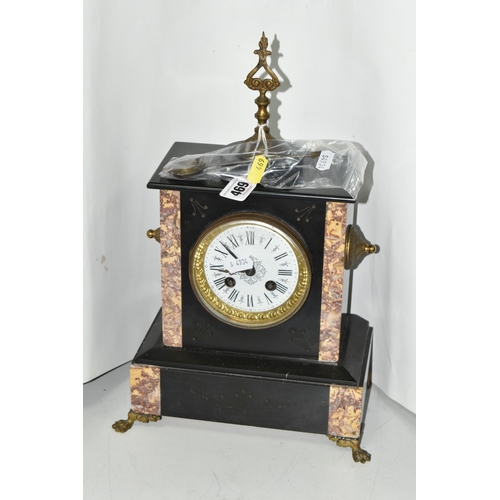 469 - A LATE 19TH CENTURY FRENCH BLACK SLATE MANTEL CLOCK, white enamel dial with gilt bezel, gilt finial ... 