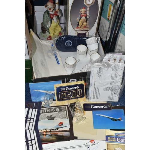 502 - A BOX OF CONCORDE ITEMS, CLOCK, AND CERAMICS, to include a small collection of Concorde memorabilia:... 