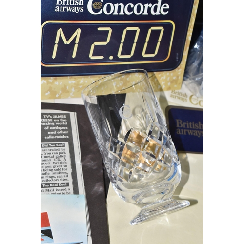 502 - A BOX OF CONCORDE ITEMS, CLOCK, AND CERAMICS, to include a small collection of Concorde memorabilia:... 