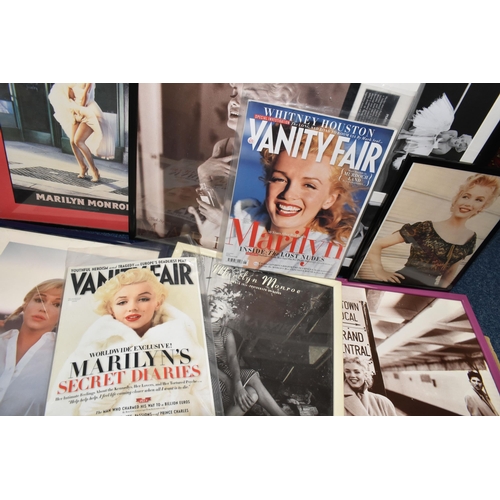 503 - FIVE BOXES OF BOOKS, DVDs CDs & PHOTOGRAPHS FEATURING MARILYN MONROE and comprising over forty-five ... 