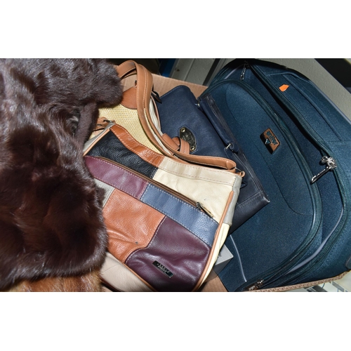 518 - TWO BOXES OF LADIES HANDBAGS AND FUR STOLES, to include a green Antler weekend bag, two brown mink f... 