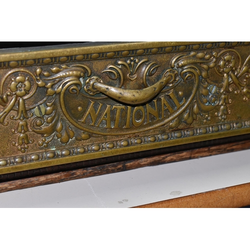 521 - A LATE 19TH CENTURY NATIONAL CASH REGISTER BRASS TILL, serial no.298179, with till roll container, m... 