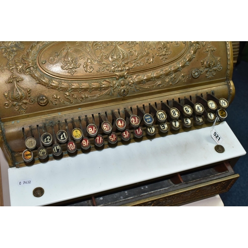 521 - A LATE 19TH CENTURY NATIONAL CASH REGISTER BRASS TILL, serial no.298179, with till roll container, m... 