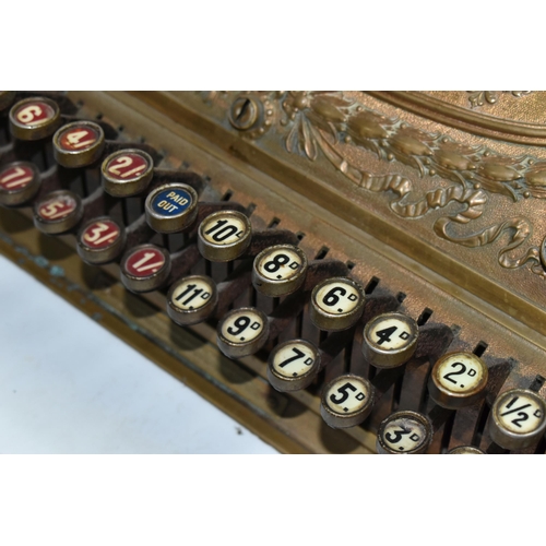 521 - A LATE 19TH CENTURY NATIONAL CASH REGISTER BRASS TILL, serial no.298179, with till roll container, m... 