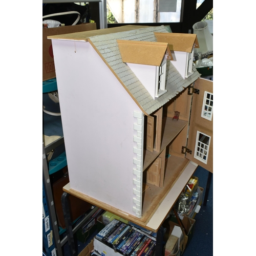 522 - A MODERN WOODEN DOLLS HOUSE, modelled as a two storey villa, front opens to reveal two rooms over tw... 