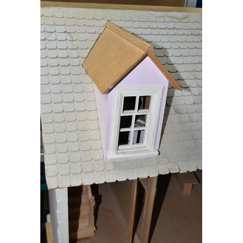 522 - A MODERN WOODEN DOLLS HOUSE, modelled as a two storey villa, front opens to reveal two rooms over tw... 