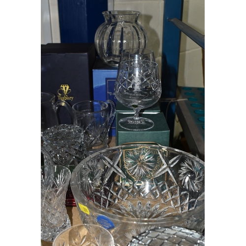 551 - A QUANTITY OF CUT CRYSTAL AND GLASSWARE, comprising a boxed Dartington Crystal vase, two boxed Tutbu... 