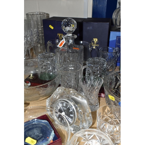 551 - A QUANTITY OF CUT CRYSTAL AND GLASSWARE, comprising a boxed Dartington Crystal vase, two boxed Tutbu... 