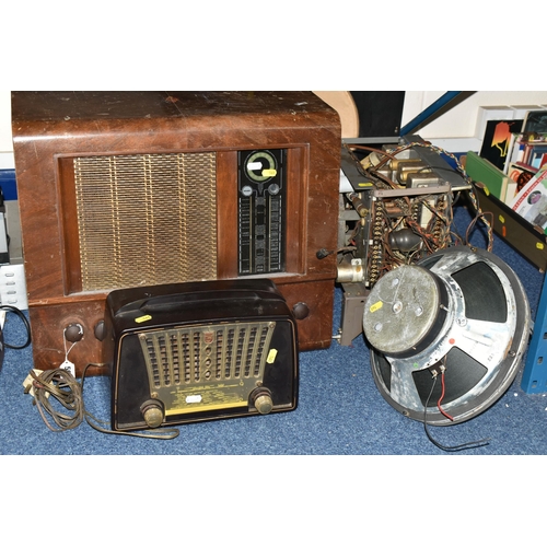 561 - A LARGE BUSH RADIOGRAM, Type P.B 65, a Philips Bakelite radio type 1410, together with a large speak... 