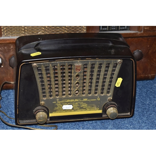 561 - A LARGE BUSH RADIOGRAM, Type P.B 65, a Philips Bakelite radio type 1410, together with a large speak... 