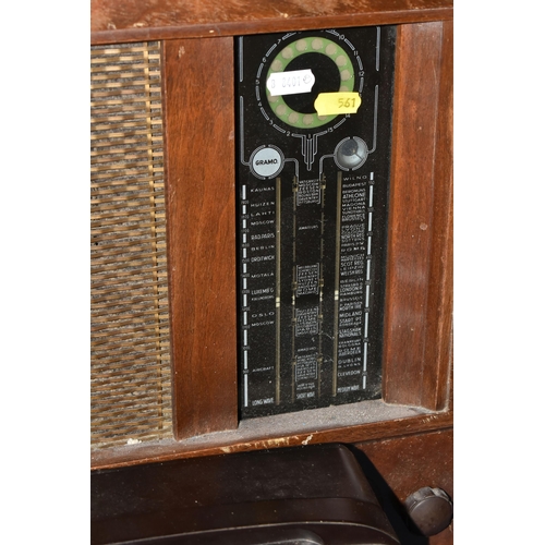 561 - A LARGE BUSH RADIOGRAM, Type P.B 65, a Philips Bakelite radio type 1410, together with a large speak... 