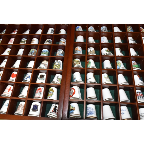 563 - A COLLECTION OF THIMBLES, approximately four hundred and fifty to five hundred, with some wooden dis... 