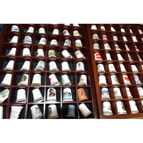 563 - A COLLECTION OF THIMBLES, approximately four hundred and fifty to five hundred, with some wooden dis... 